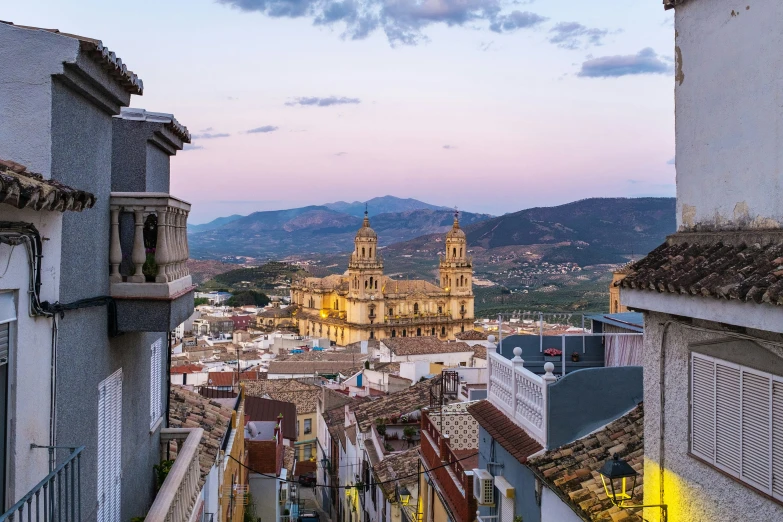 a cathedral towering over a city with buildings