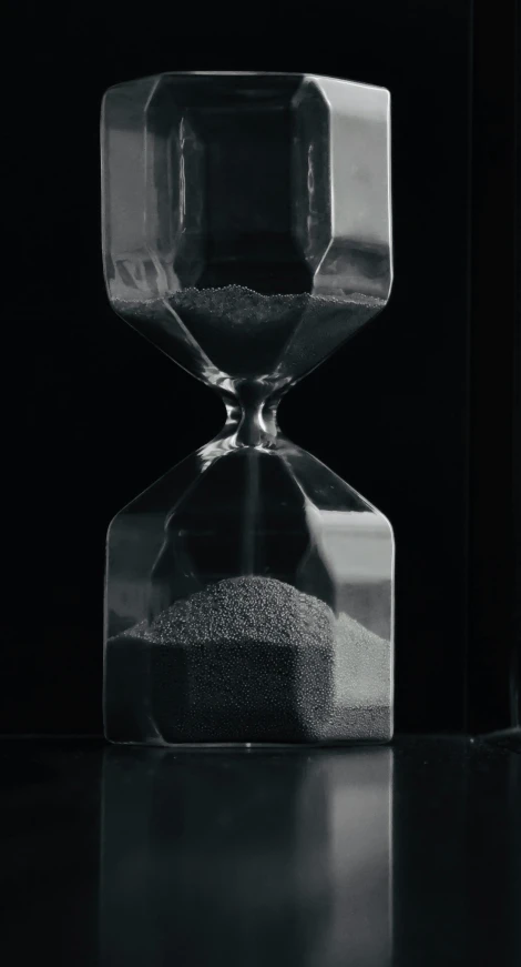 an hourglass is sitting on the table