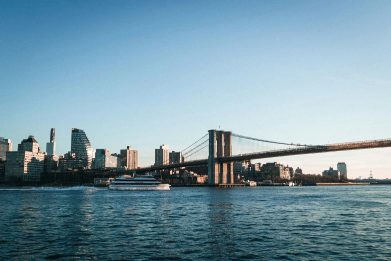 an image of a boat going across a bridge