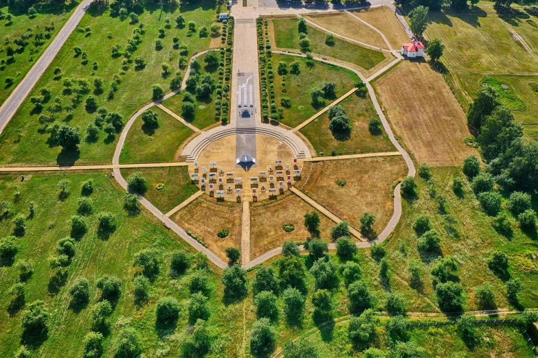 a bird - eye view of a park surrounded by green trees