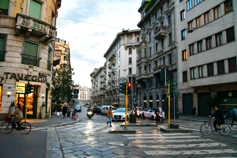 a street filled with traffic and lots of tall buildings