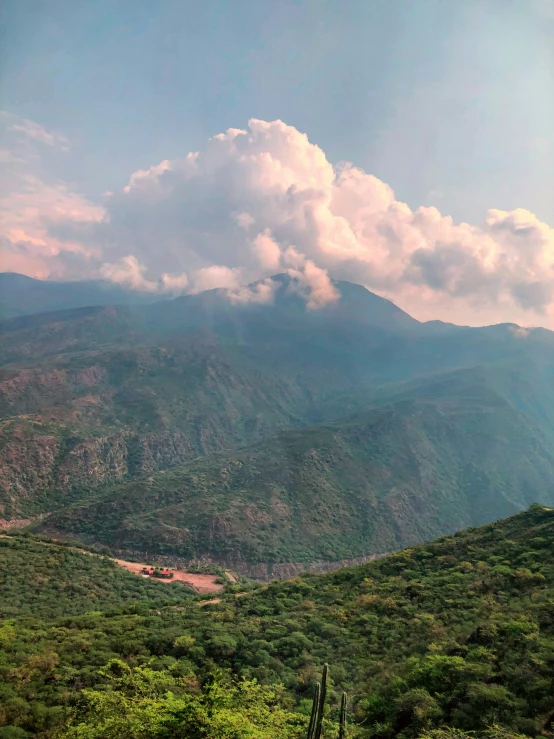 a very large hill in a big big open land