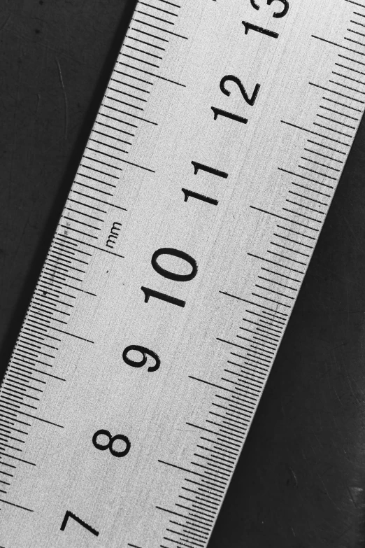 a measuring tape on top of some table