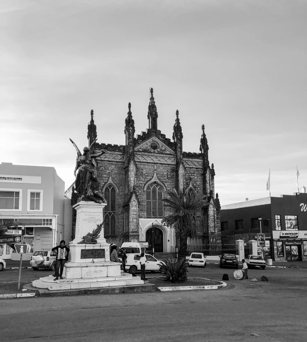 a large cathedral in the middle of a parking lot