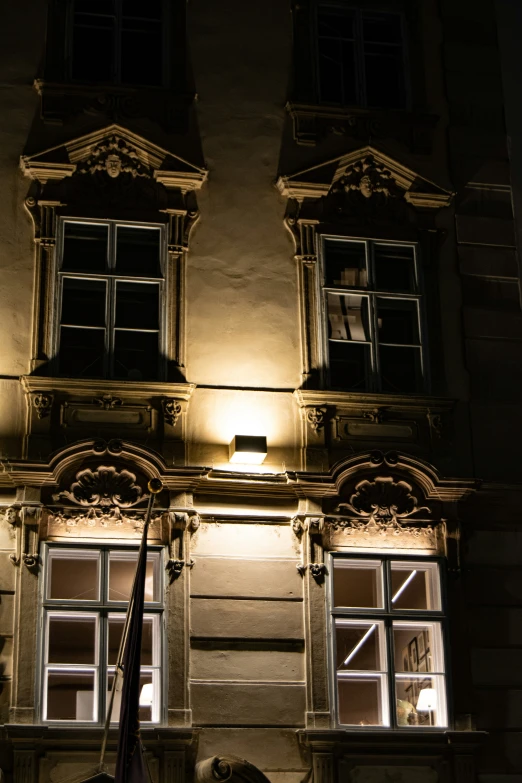 the building in front of the street light has no lighting on it