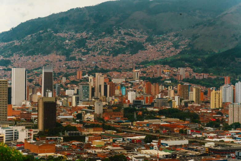 the city of santiago with mountains and trees