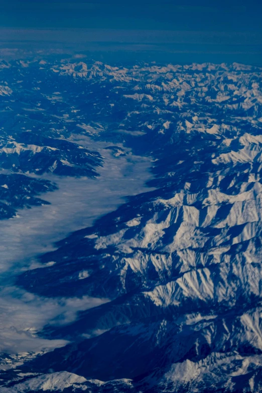 a very big bunch of mountains near some water