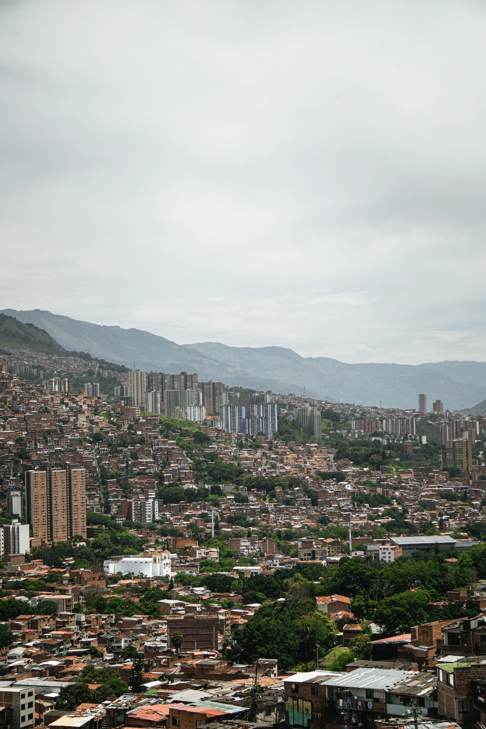 this picture shows the entire city and hills in the distance