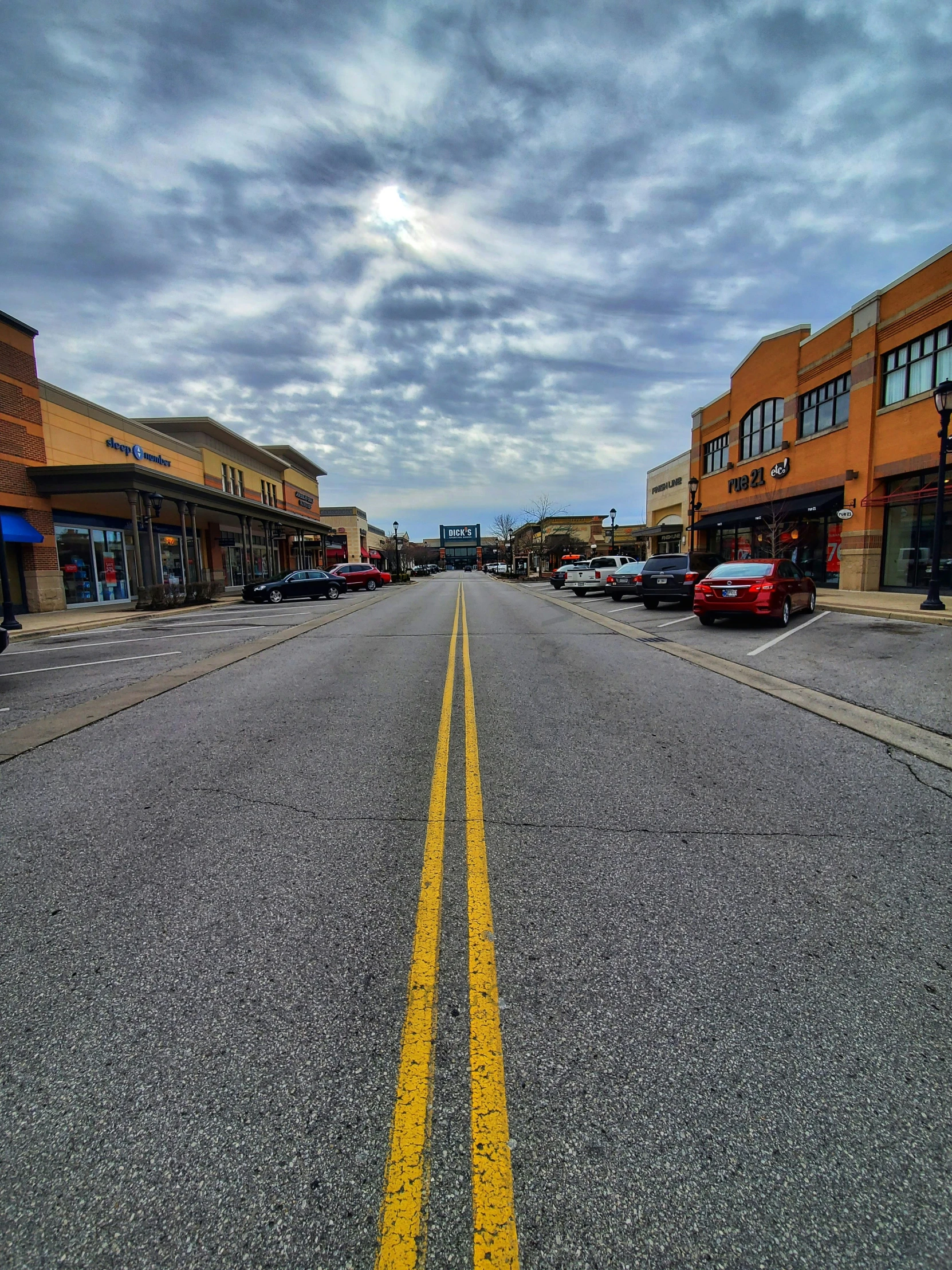 a street with a yellow line in the middle