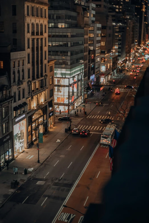 the city street has lights on at night