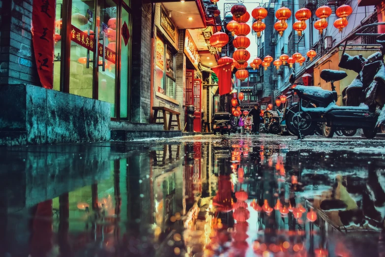 an image of a city street during the day with lanterns