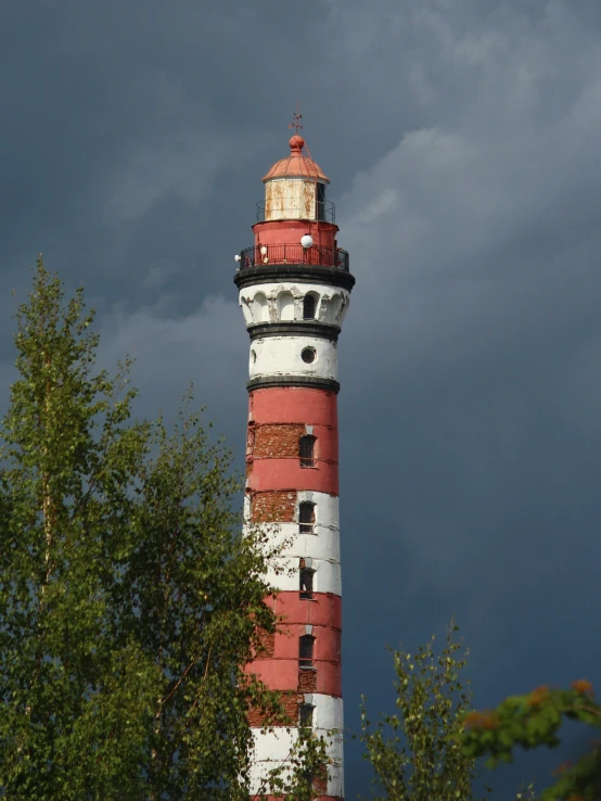 a big tower stands tall on the hill