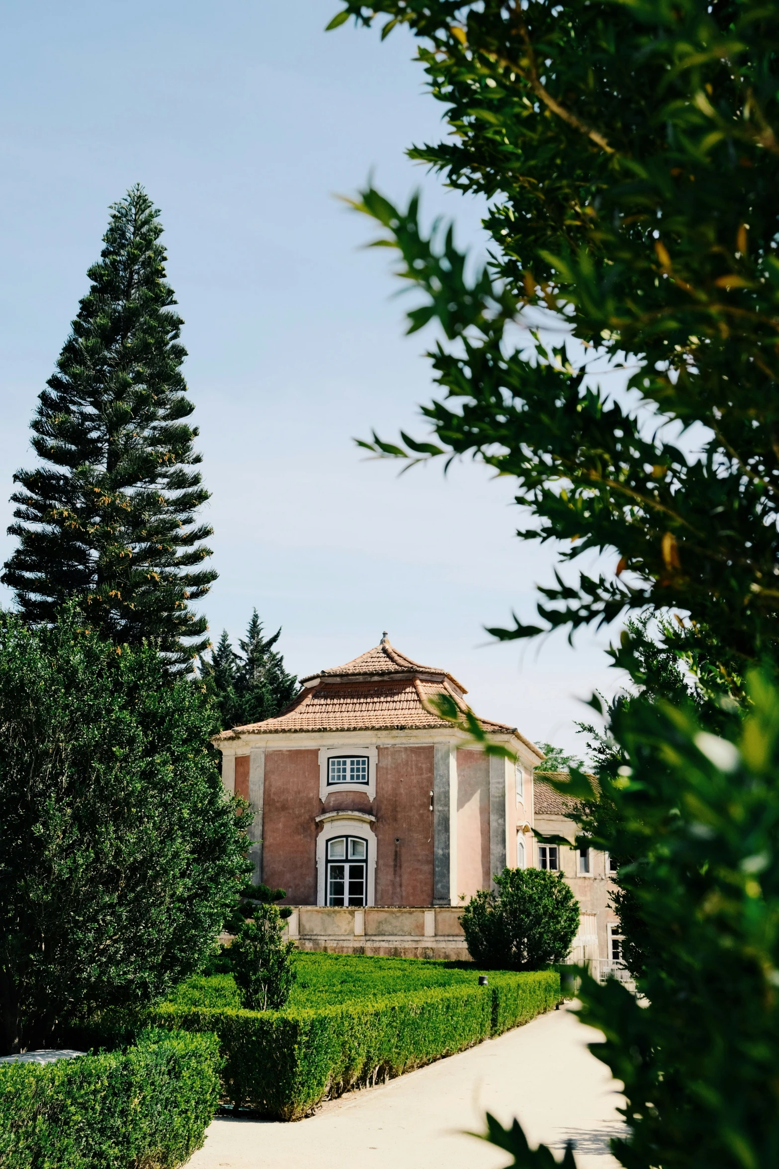 a large house with a very big garden