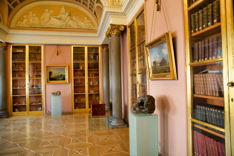 a long room with an animal head on a pedestal