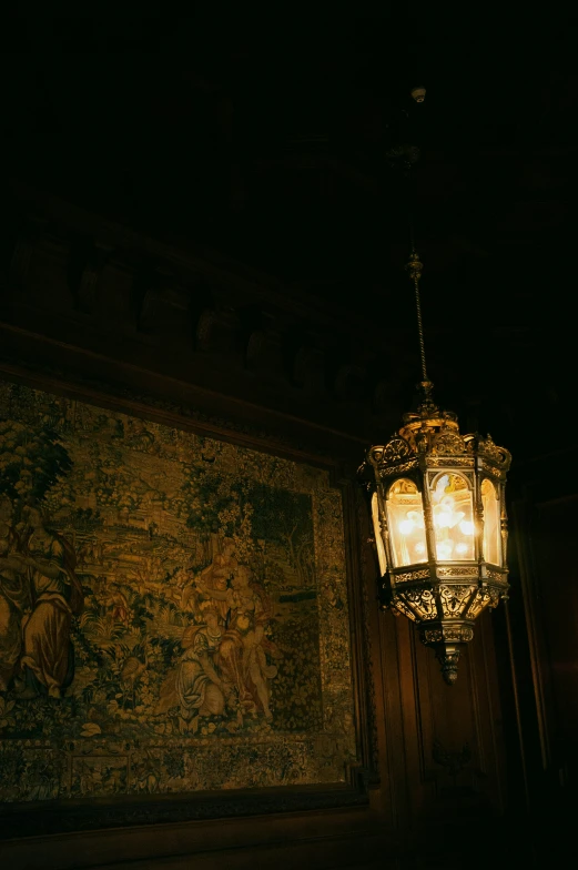 lamp attached to ceiling in large walled dark room