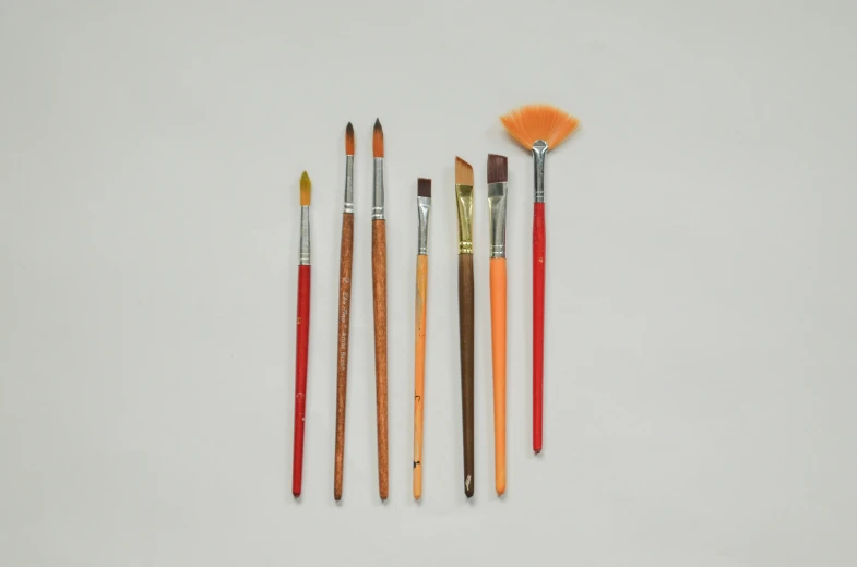 six brushes that are sitting side by side