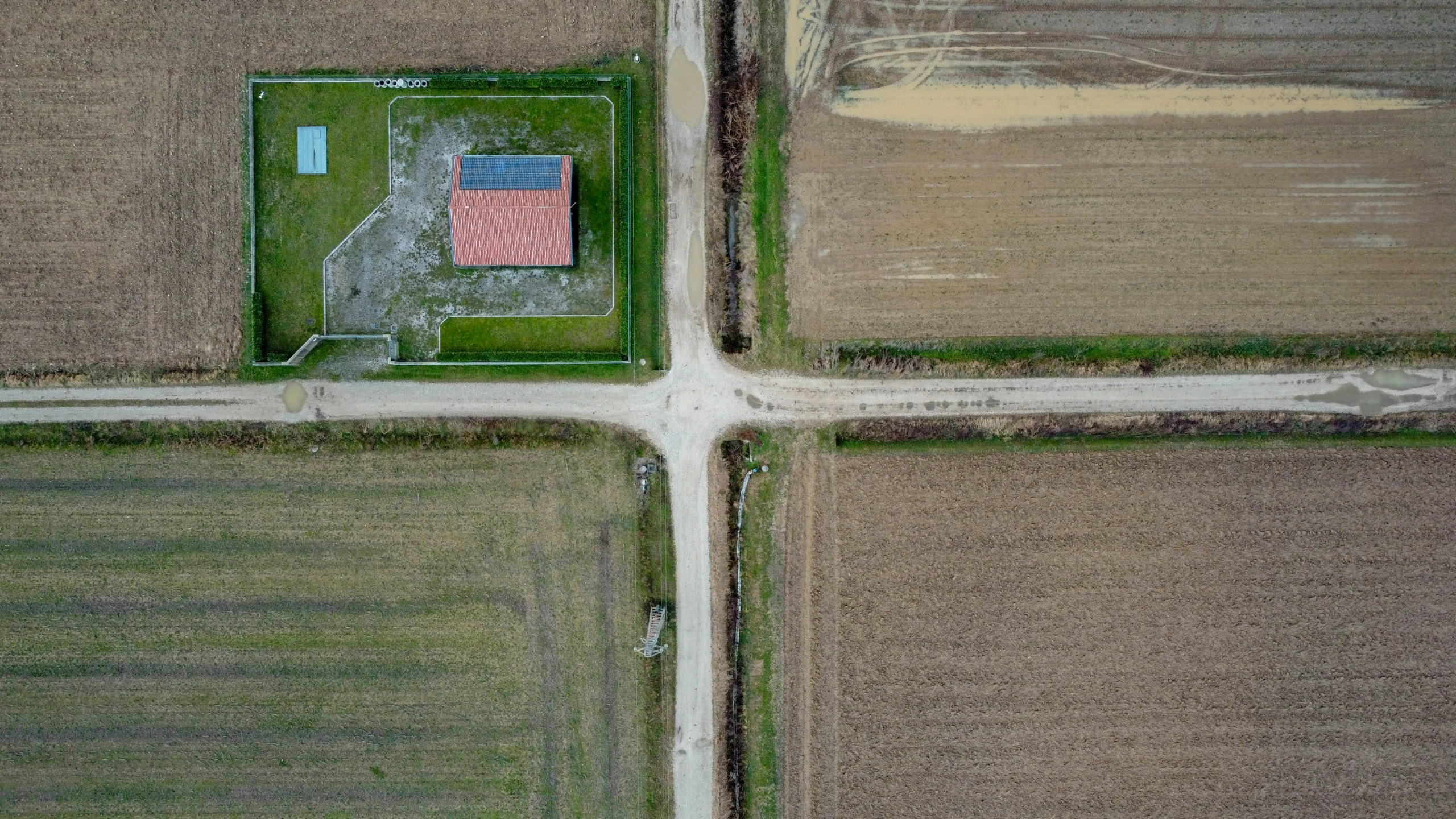 a large field in the middle of a rural area