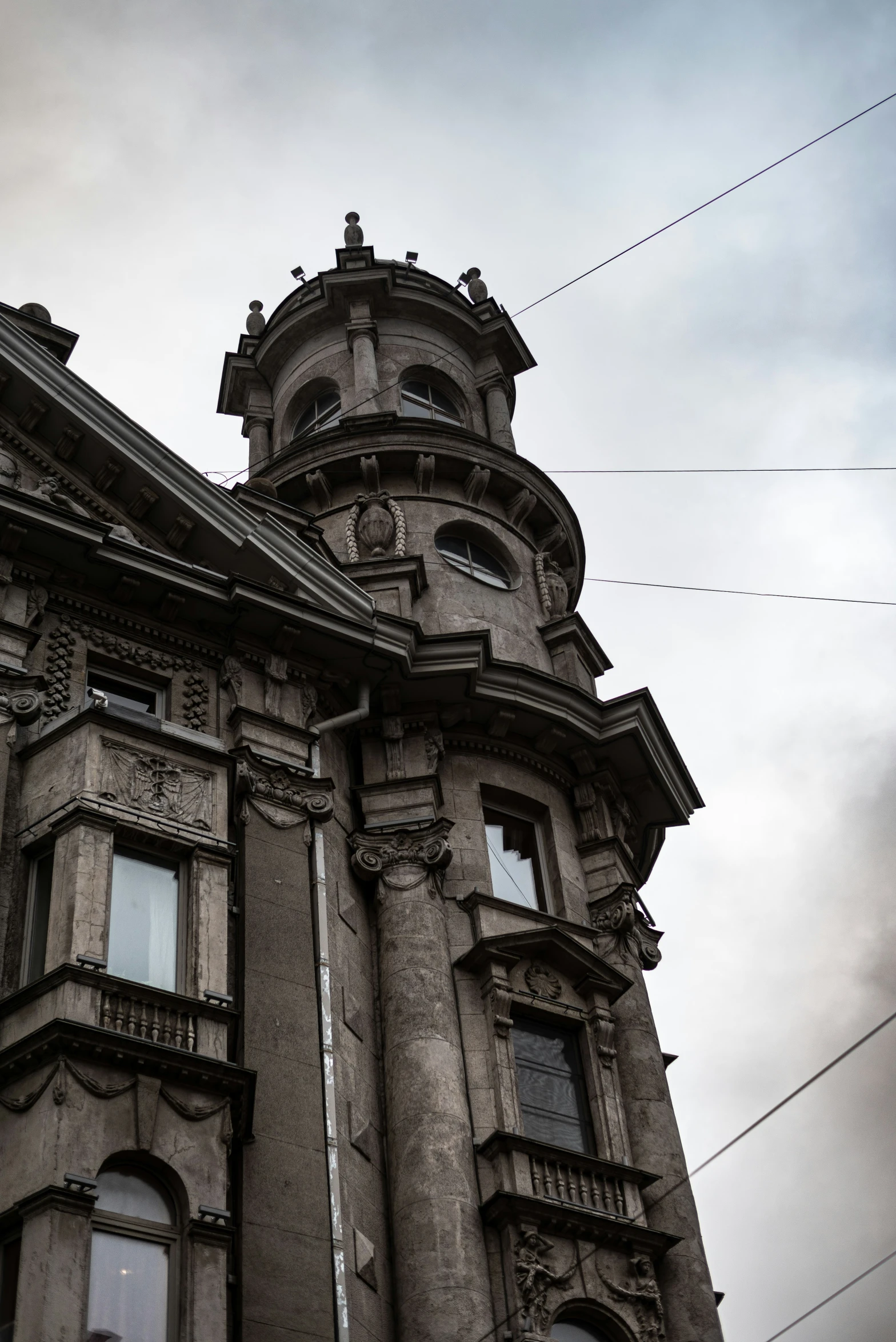 an old building on the corner of a street