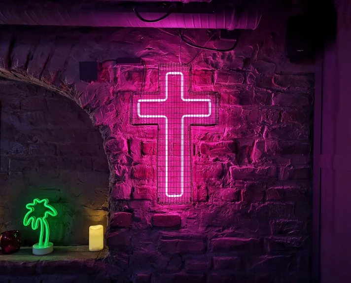 a cross in the corner of a room lit by purple lights