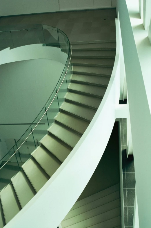 a man walking down stairs with an umbrella