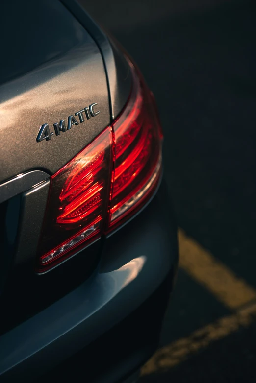 the rear end of a parked car at night