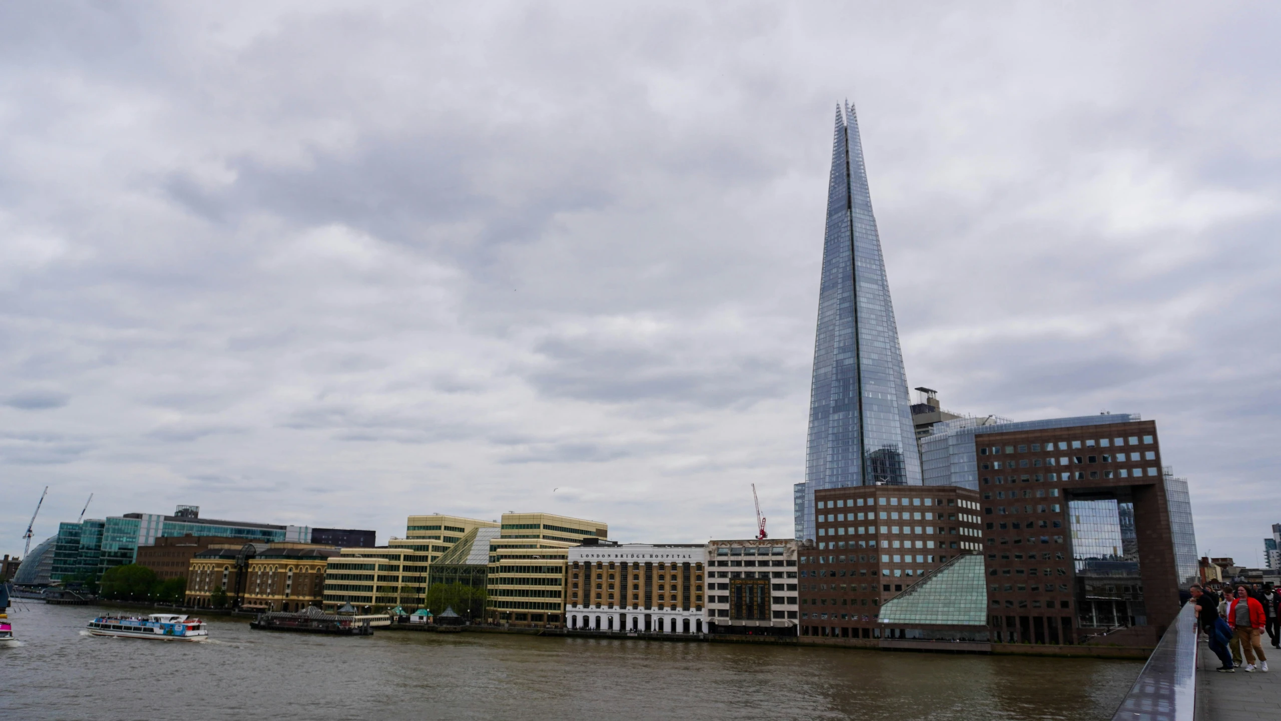 the city skyline is seen from the water