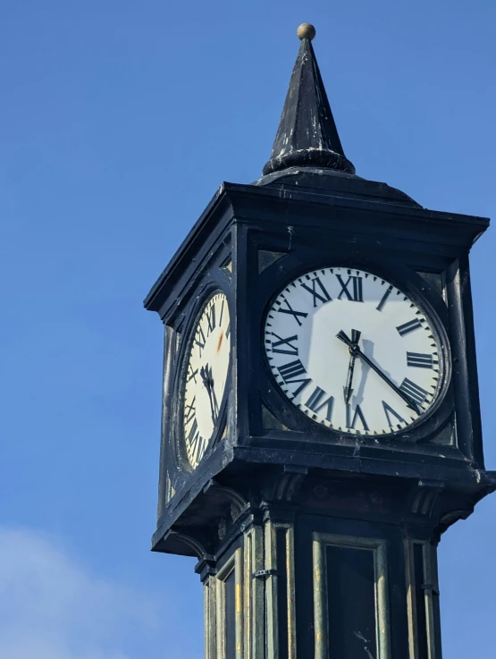 there is a clock tower that is against the sky