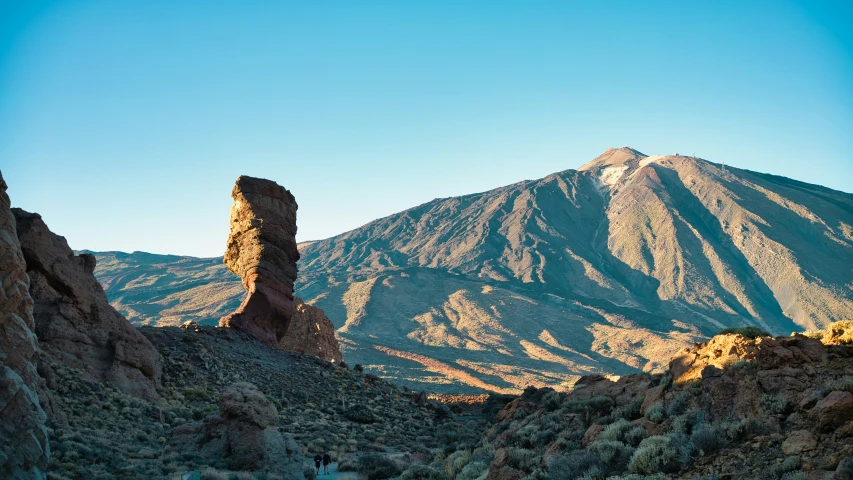 mountains with no trees and no one with no trees in front of them