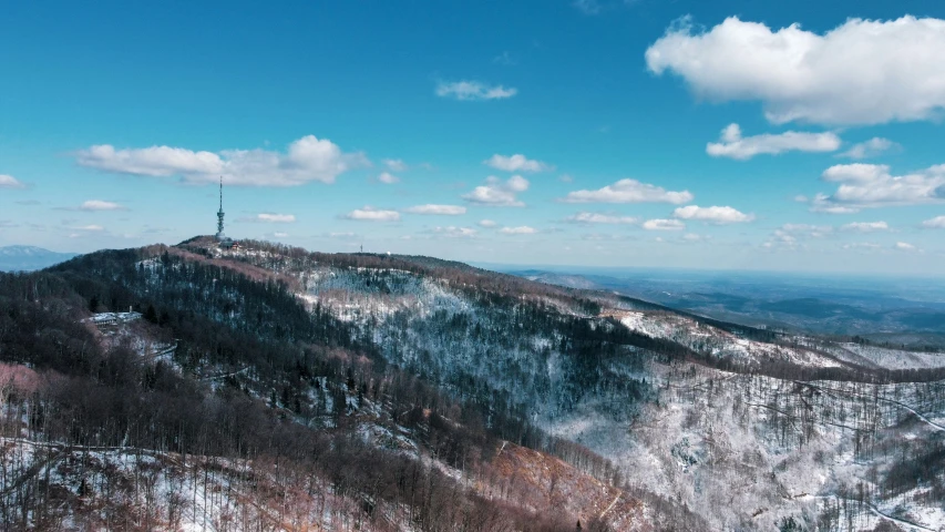 a view of the summit of a snowy mountain