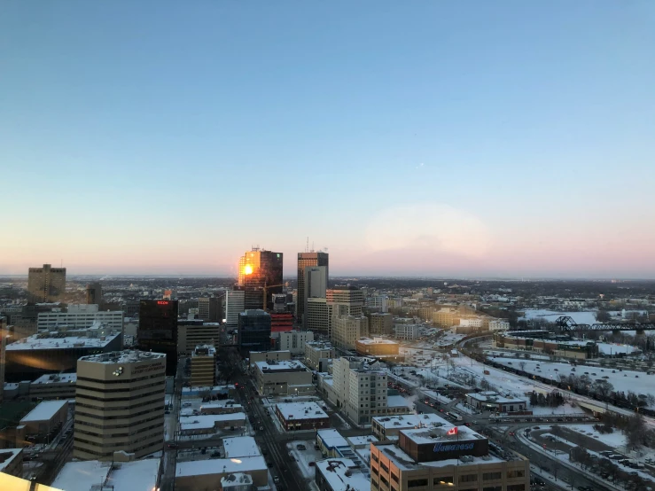 an aerial view of a city in winter