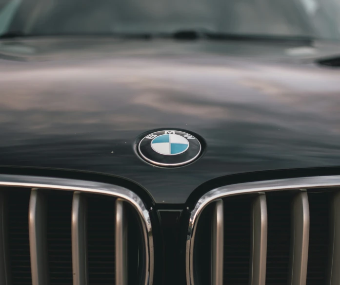 the front view of a bmw car with the emblem on