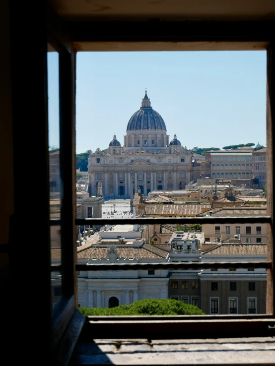 a view of the roman forum in rome from inside a building