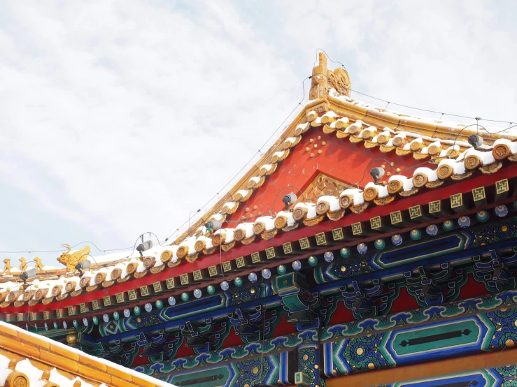 colorful architectural structure on a cloudy day with sky above