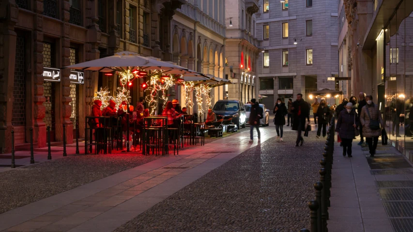 a couple of tables on a city street