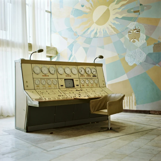 an old control panel sitting on top of a table