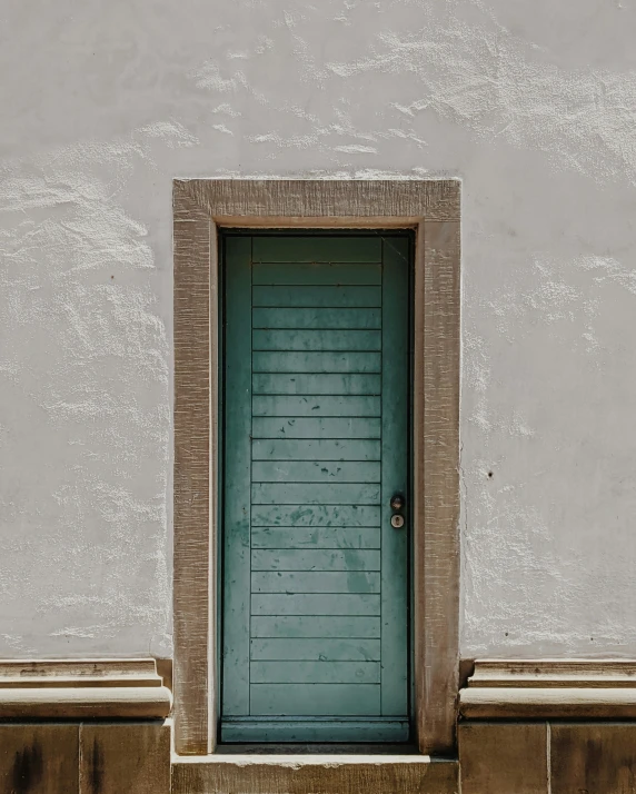 the door is open on a concrete building