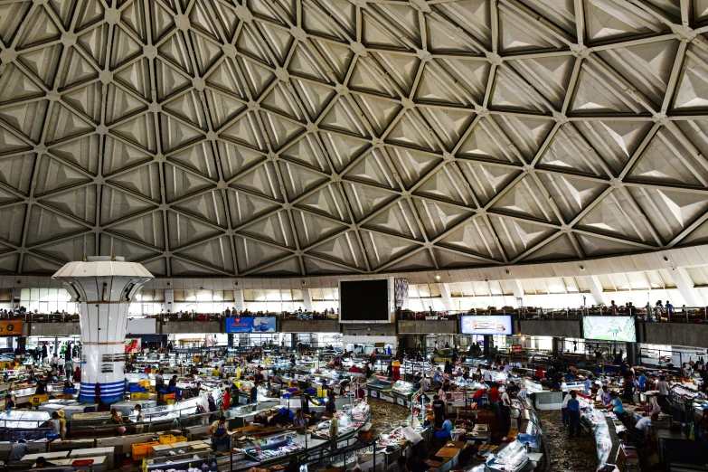 there are many people that are shopping inside the airport