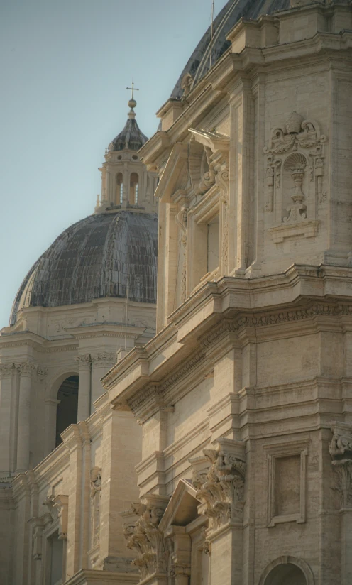 the corner of two large buildings with domes