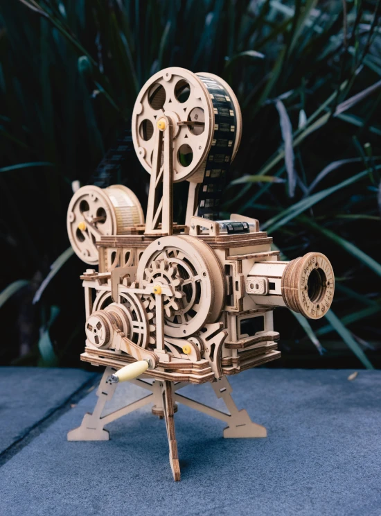 an image of a wooden model of a film projector