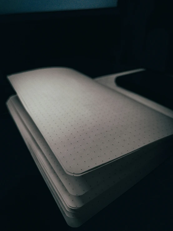 a large white tray with a black background