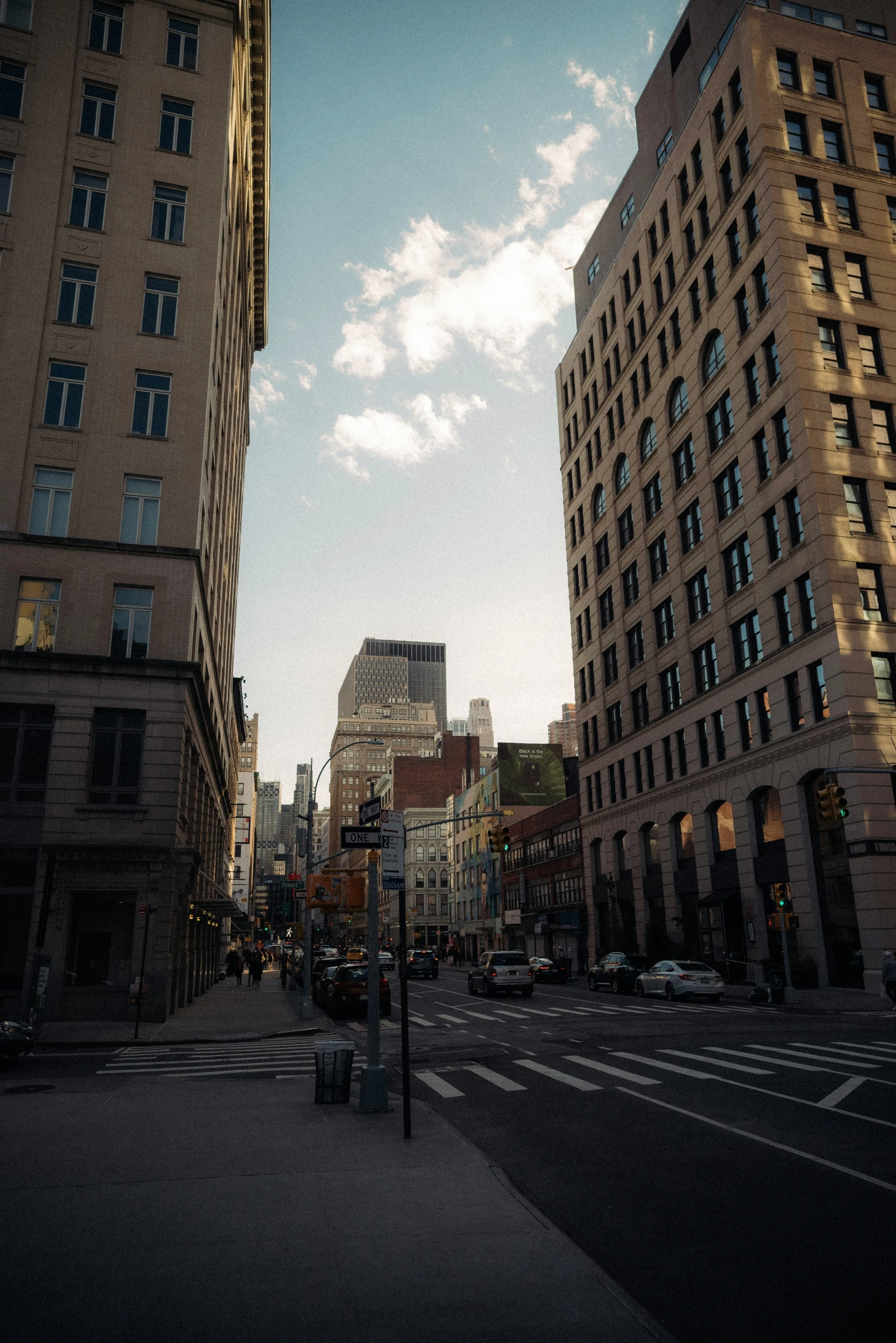 an old street with a lot of tall buildings