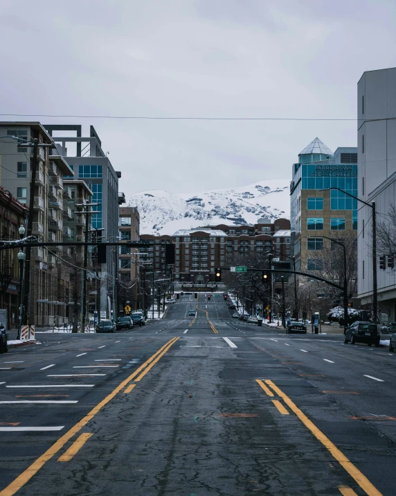 a road in the middle of some buildings