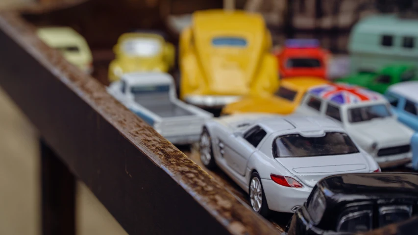 there are many toy cars that are sitting on the table