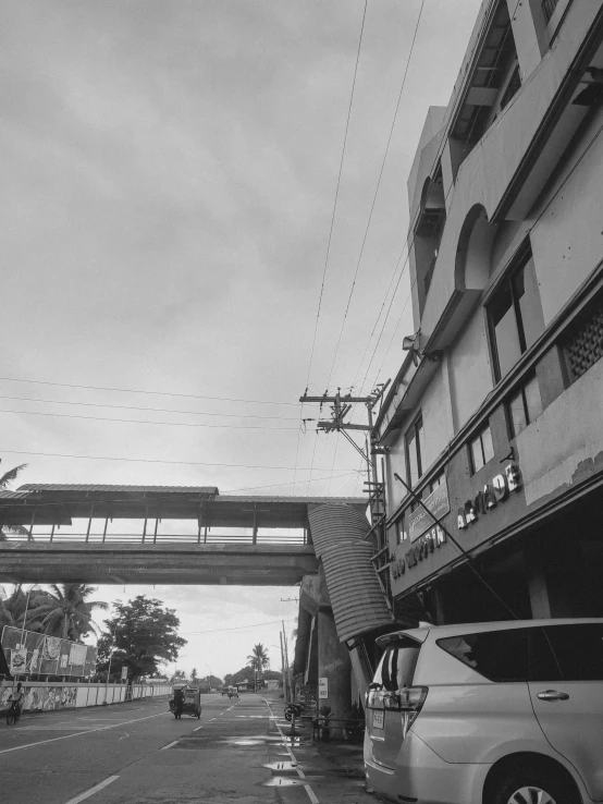 black and white po of a city street in the rain