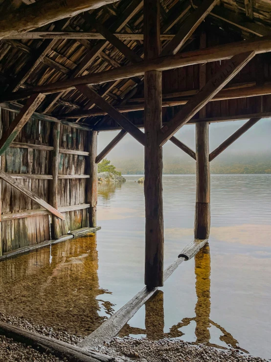 the inside of a house with water surrounding it