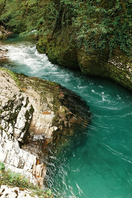 the river is blue, green and white water