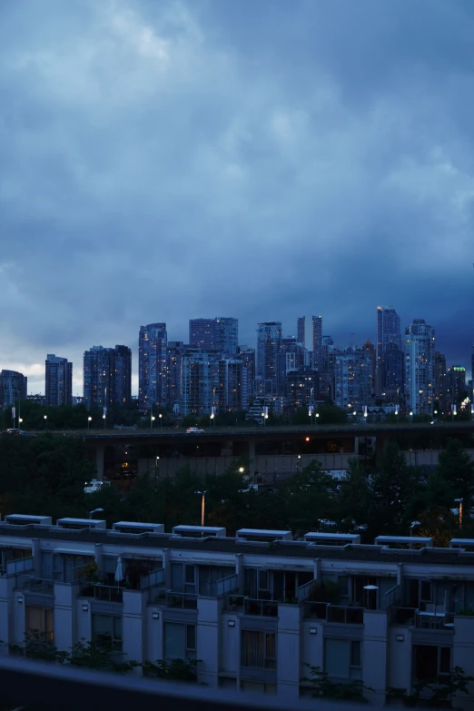 the sky in a city at dusk