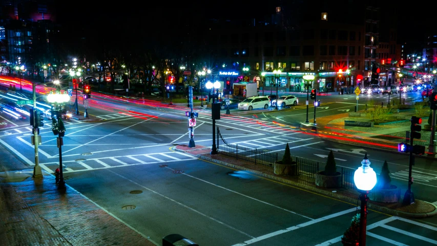 some street lights traffic and buildings at night