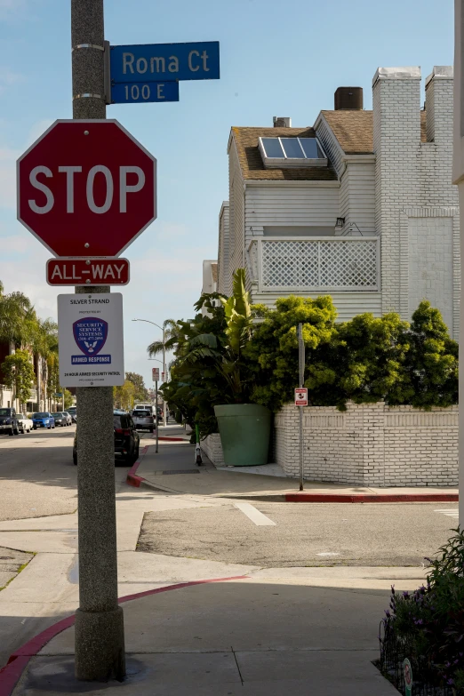 a couple of street signs are on the post