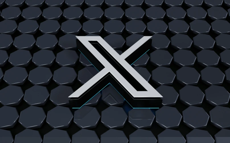 the letter x is displayed with many circles of circles